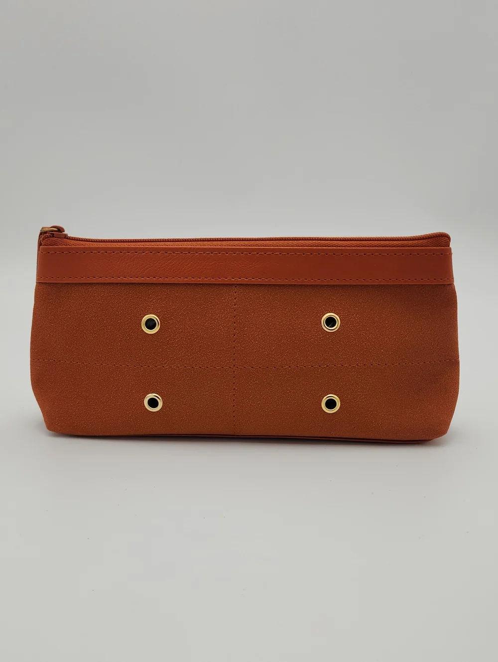 Estee Lauder Sleek Burnt Orange Zip Pouch with Gold Grommets